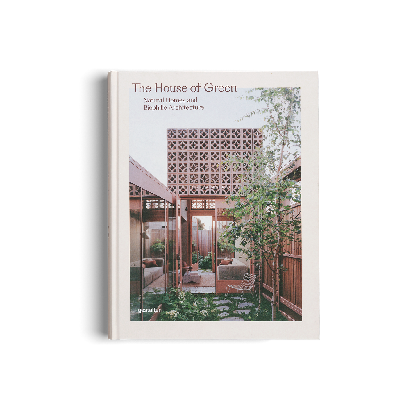 Book titled 'The House of Green' with a cover featuring an image of a modern house with greenery.