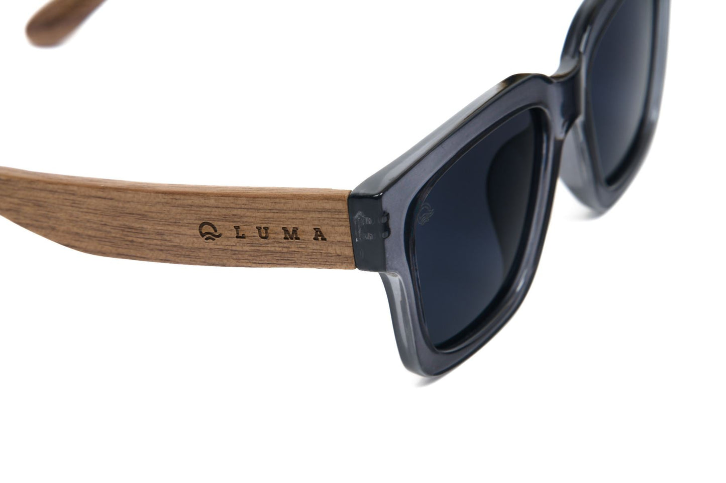 Sunglasses with wooden frame and dark lenses on a white background