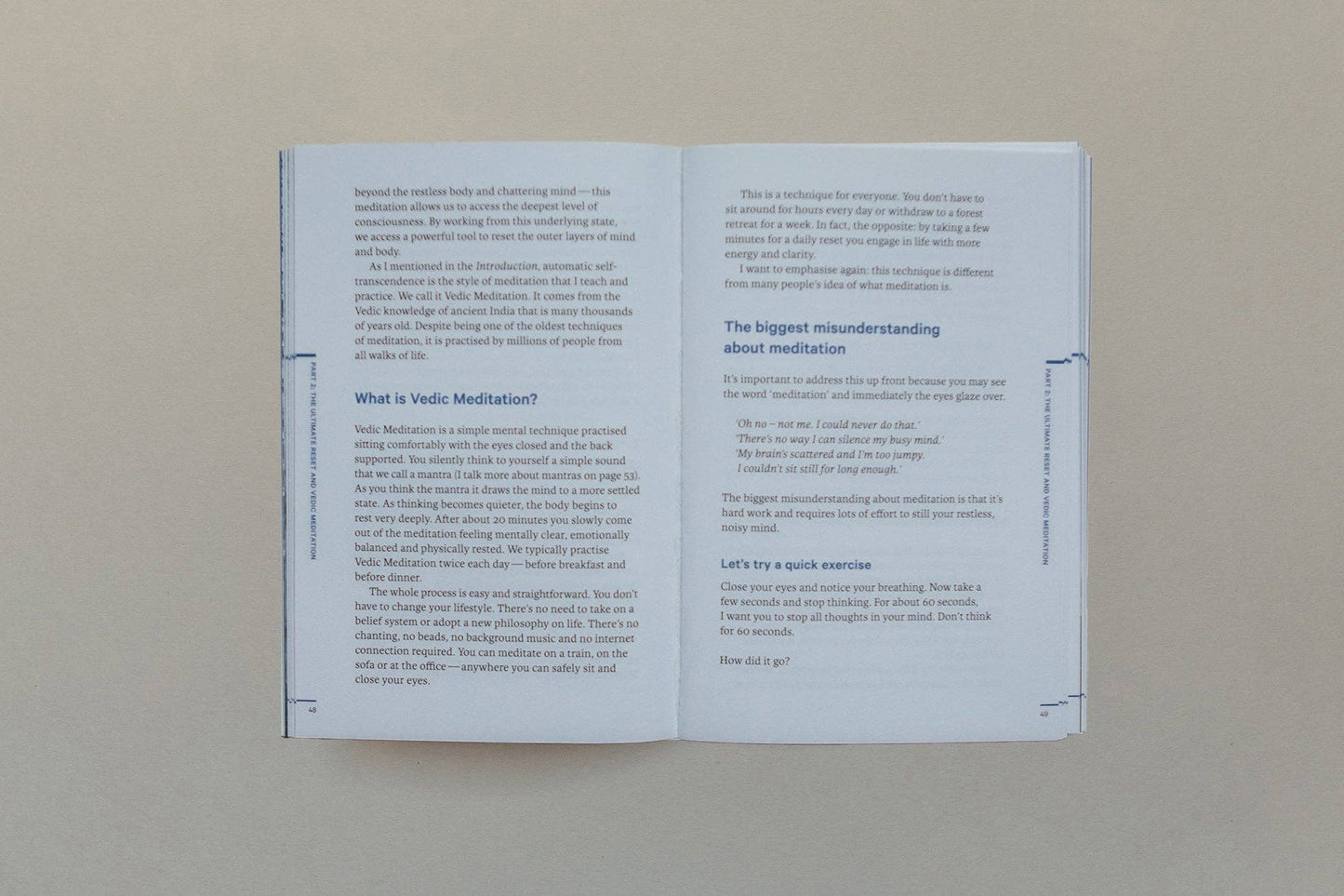 Open book with text on a plain background