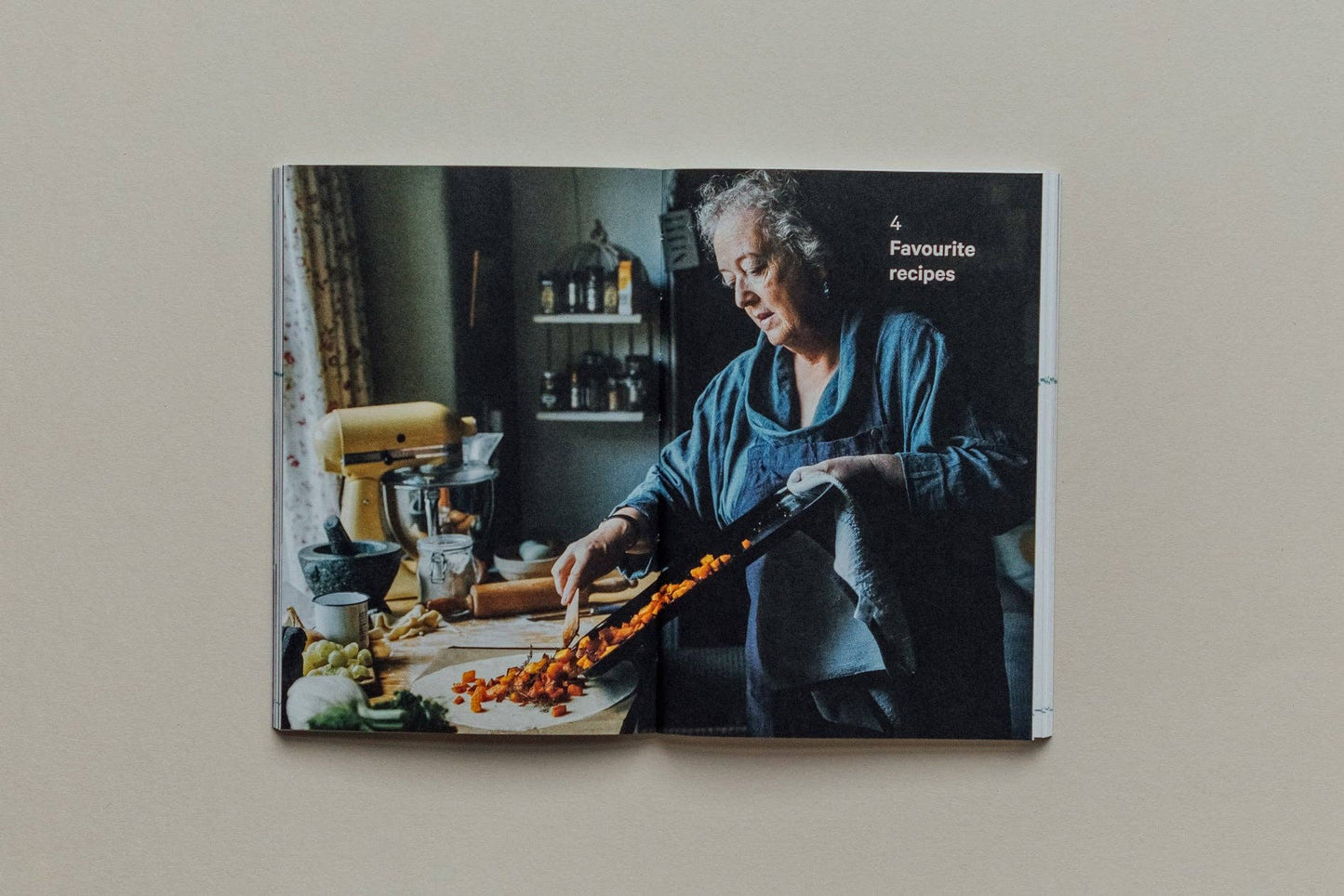 Cookbook open to a page with a person cooking, titled '4 Favourite Recipes'.