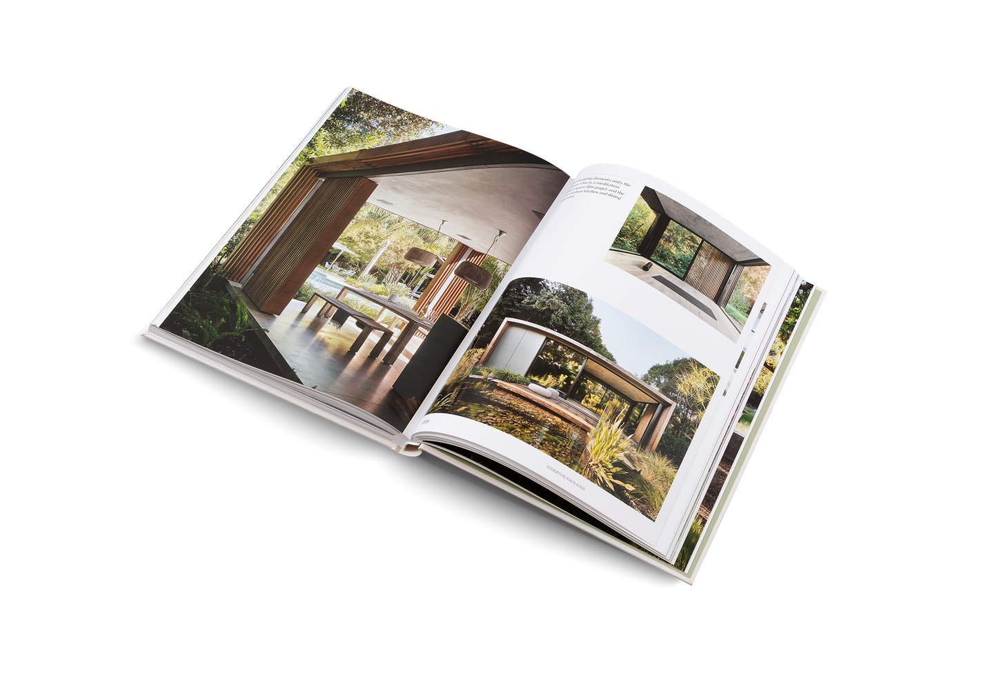 Open book showing images of a modern architectural design with greenery.