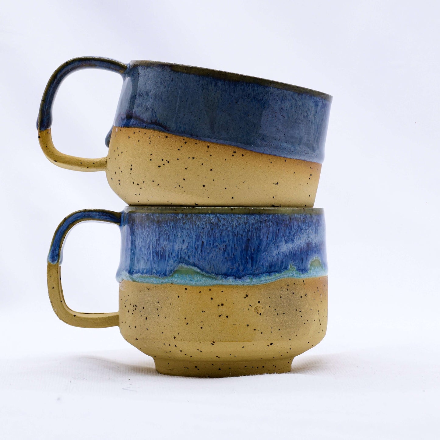Bluvio Sienna Handmade Ceramic Mug in stacked design, showcasing elegant craftsmanship, eco-friendly feature, UK based.