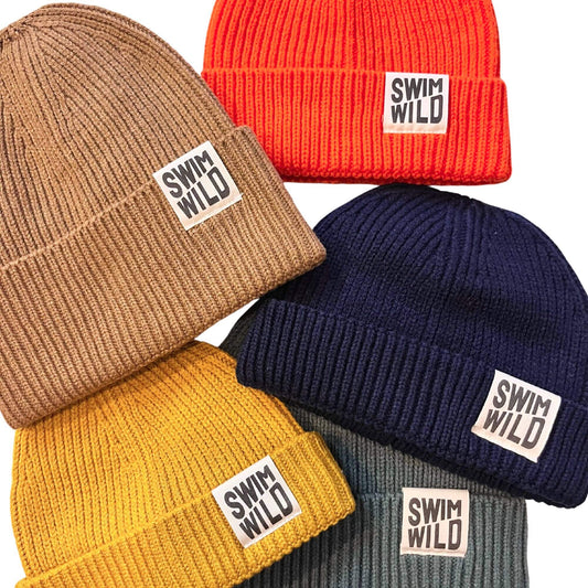 Fisherman’s knit hat in orange from Eco-Friendly-Online-Shop, offering warm, sustainable headwear for everyday wear.