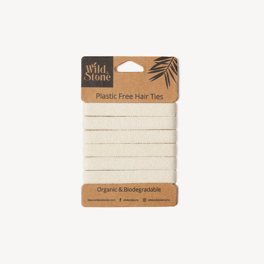 Pack of organic biodegradable hair ties with Wild Stone branding on a white background