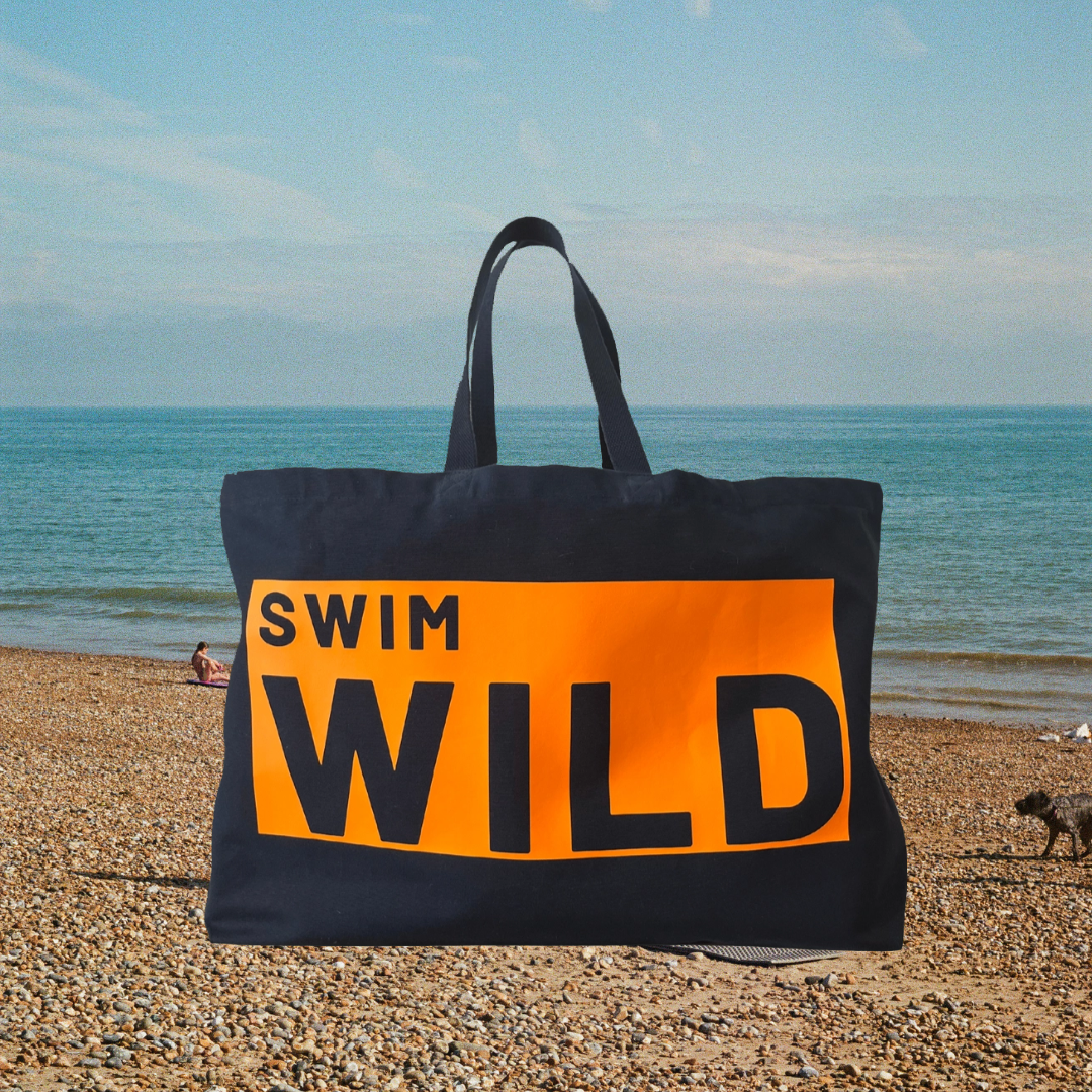 Jumbo Swim Wild Bag in navy and neon orange from Eco-Friendly-Online-Shop, offering a spacious, water-resistant design for sustainable open-water adventures.