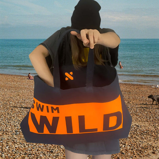 Jumbo Swim Wild Bag in navy and neon orange from Eco-Friendly-Online-Shop, offering a spacious, water-resistant design for sustainable open-water adventures.