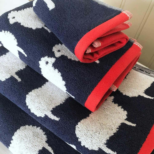 Bundle Hand Towel & Face Cloth - Kissing Sheep print stacked with red borders.