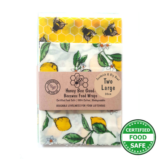Set of 2 Large Handmade Beeswax Wraps - Lemony Bees in vibrant lemon and bee patterns.