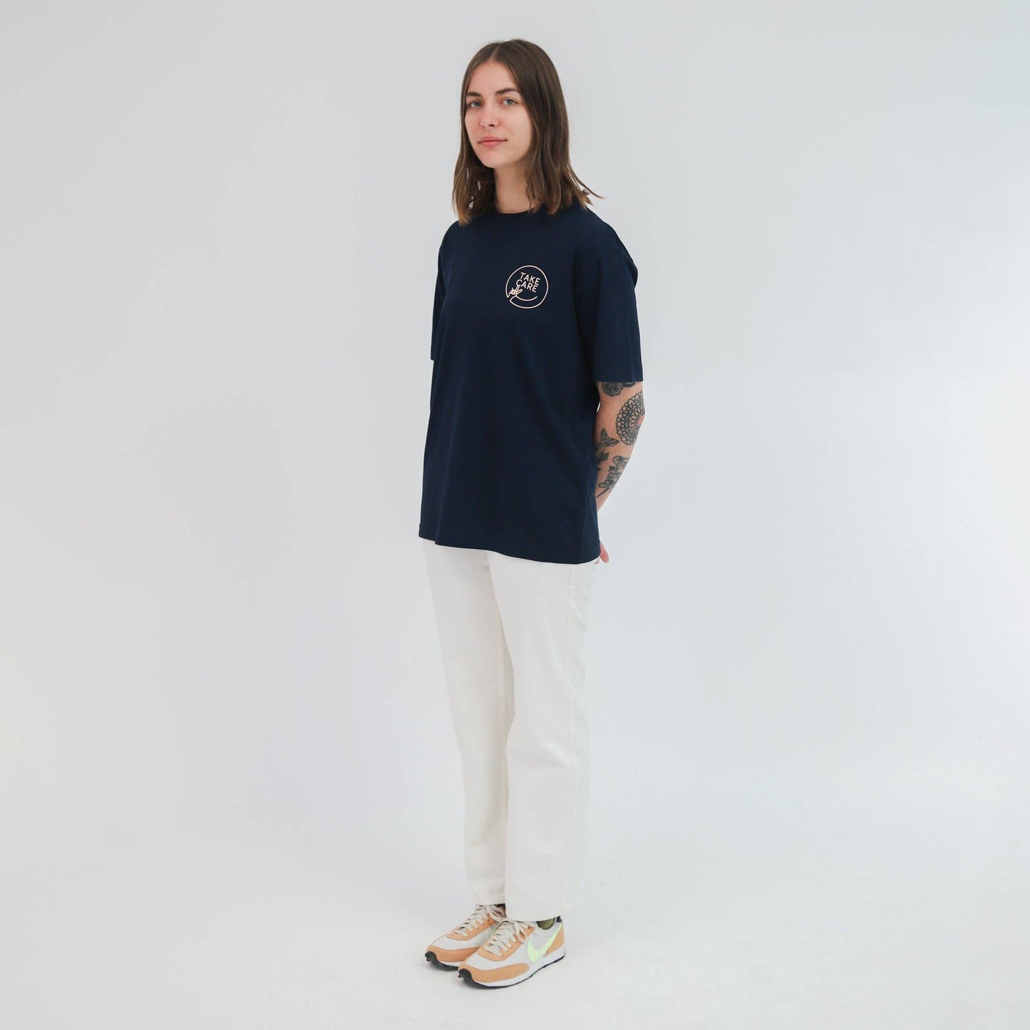 Take Care unisex T-shirt from Eco-Friendly-Online-Shop, featuring a mindful design for everyday sustainable style.
