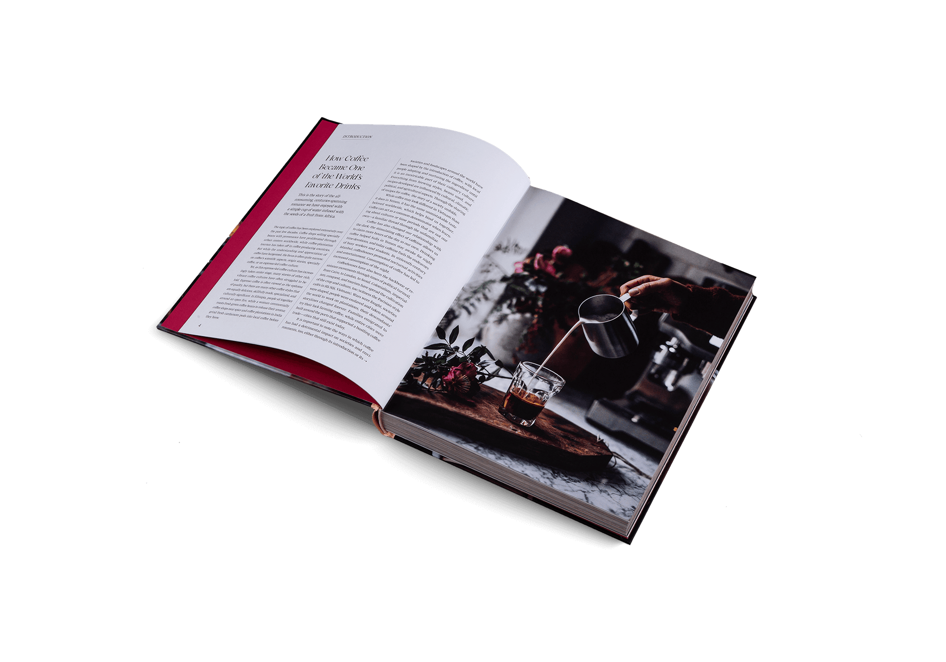 Open book with a photograph of a coffee setup on a white background