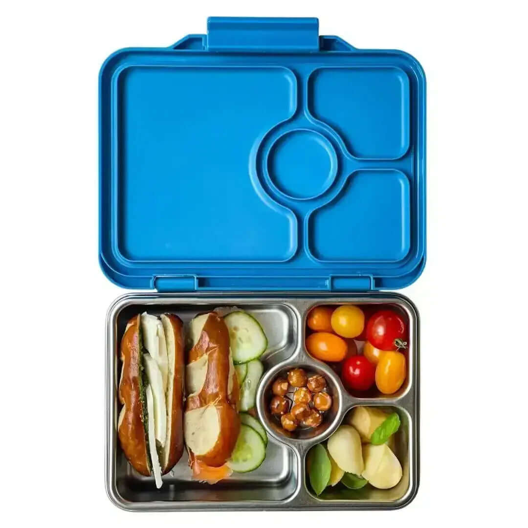 Yumbox Prêt Stainless Steel Leakproof Bento Lunch Box - Various Colours filled with sandwiches, fruit, and snacks.