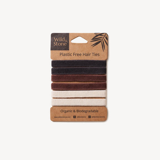 Pack of plastic-free hair ties with visible brand 'Wild & Stone' on a white background