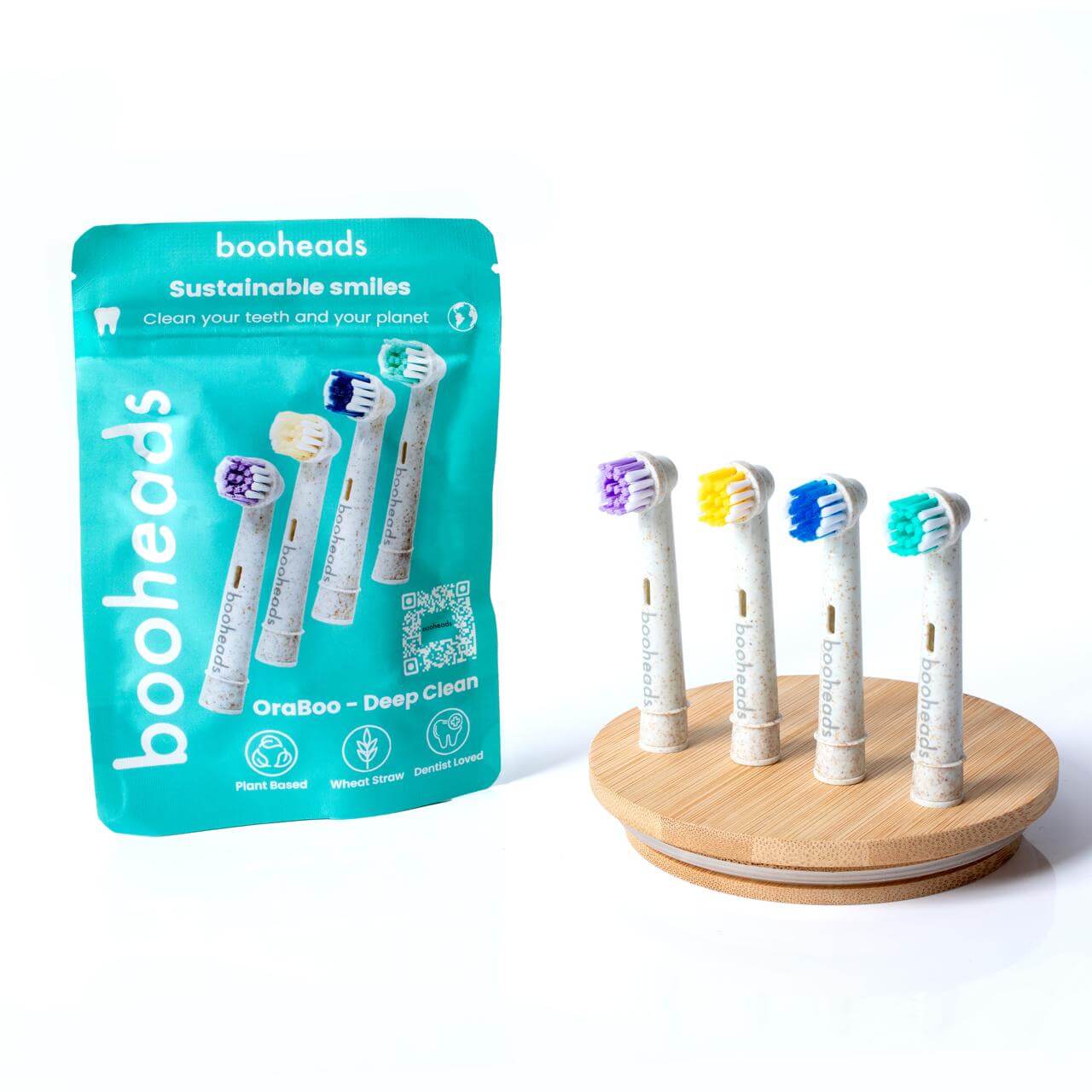 booheads toothbrush heads with packaging and wooden stand on a white background