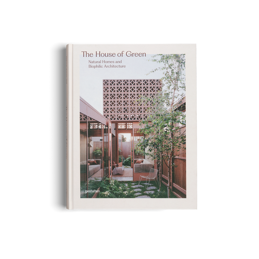 Book titled 'The House of Green' with a cover featuring an image of a modern house with greenery.