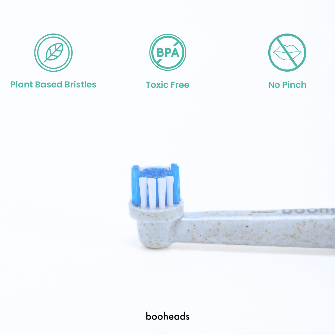Toothbrush with plant-based bristles, no BPA, and no pinch on a white background with 'booheads' branding.