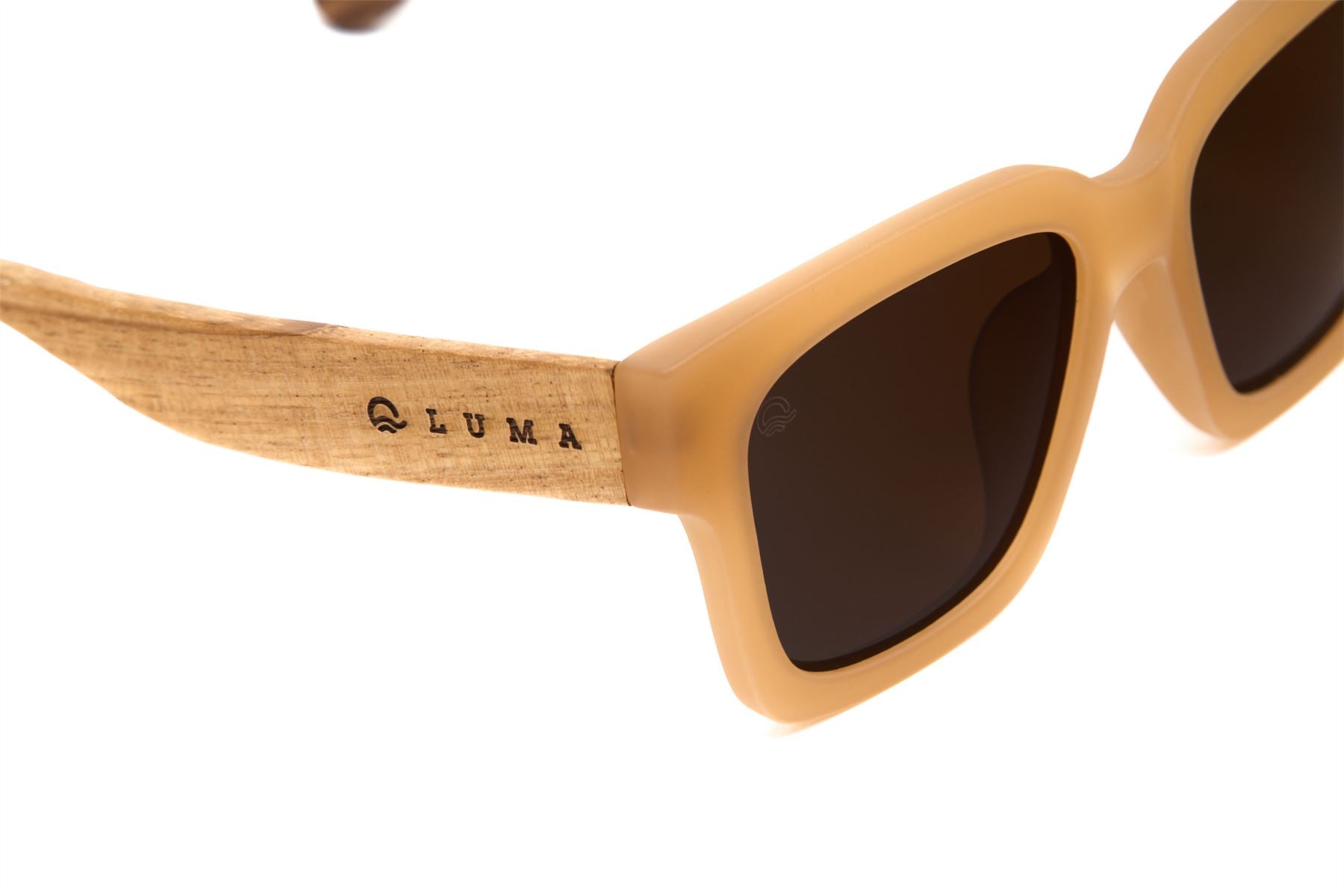 Sunglasses with wooden frame and dark lenses on a white background