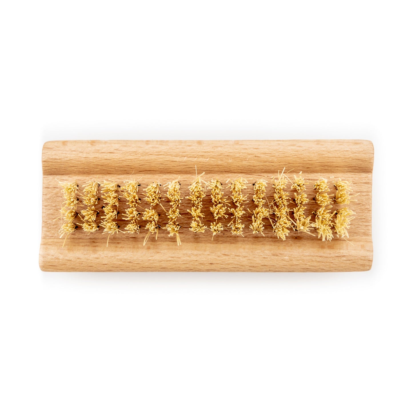 Wooden brush with natural bristles on a white background