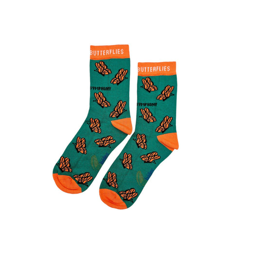 Teal socks with orange accents and butterfly patterns on a white background