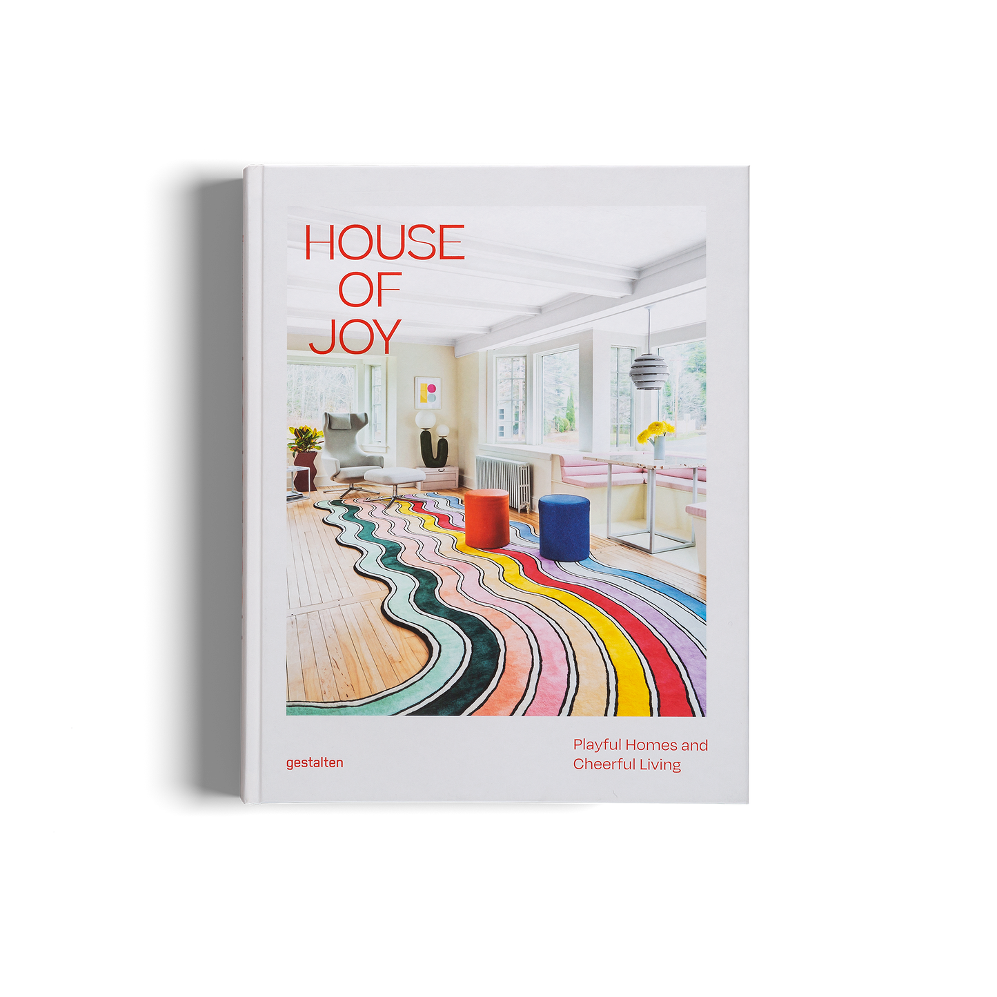 Book titled 'House of Joy' with a colorful interior design on the cover.