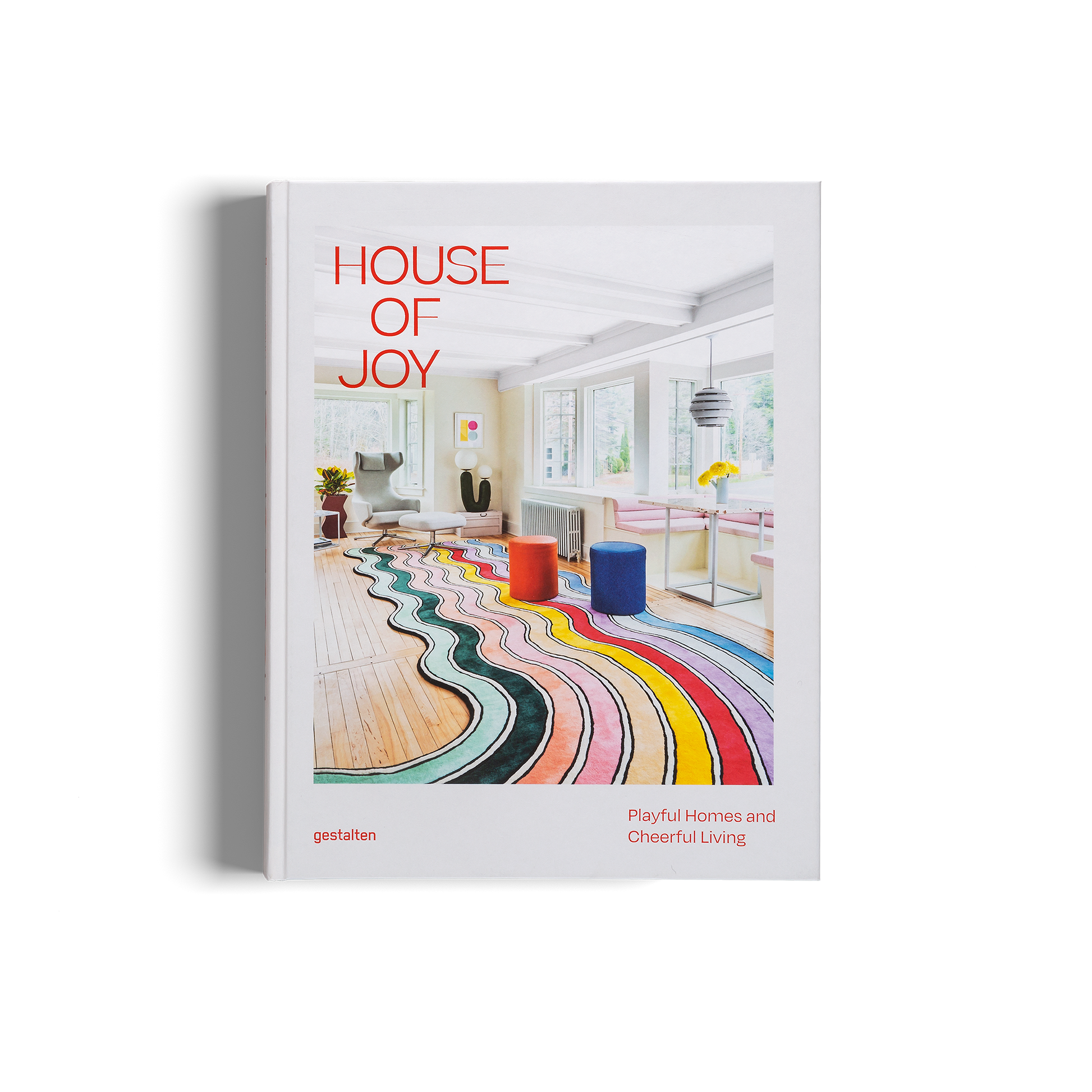 Book titled 'House of Joy' with a colorful interior design on the cover.