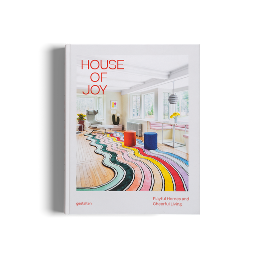 Book titled 'House of Joy' with a colorful interior design on the cover.
