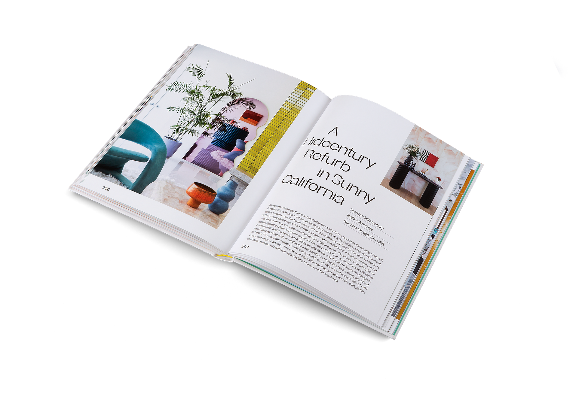 Open book with interior design content on a white background