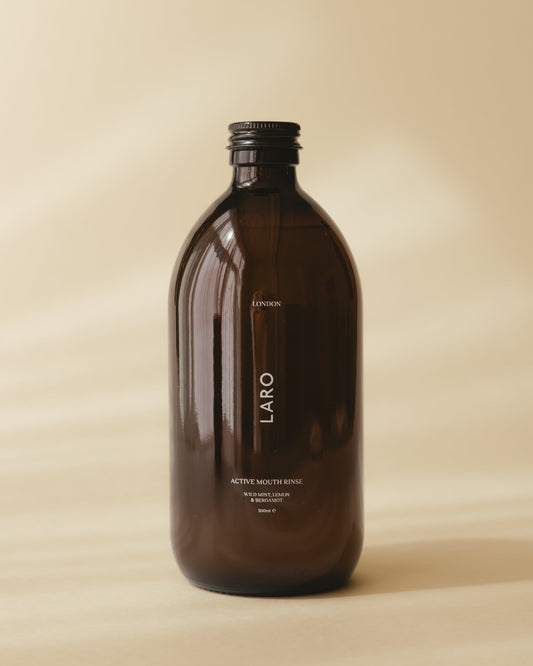 Laro Active Mouth Rinse, 500ml bottle on a minimalist background