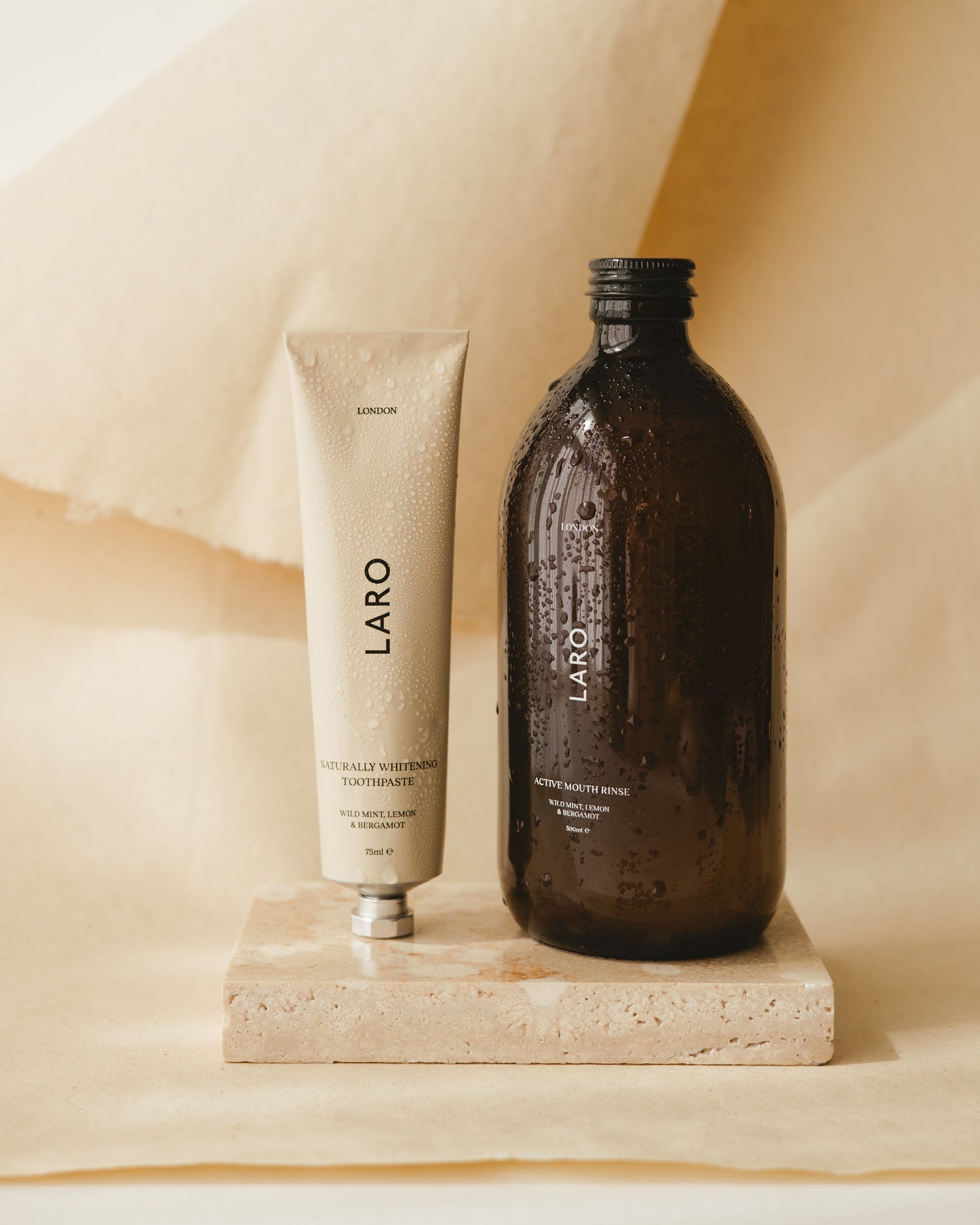 Active Mouth Rinse, 500ml alongside a hydrating tube from LARO on a textured surface.