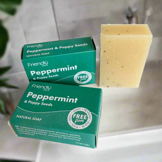 Two boxes of Friendly Peppermint soap with a bar of soap on a white background