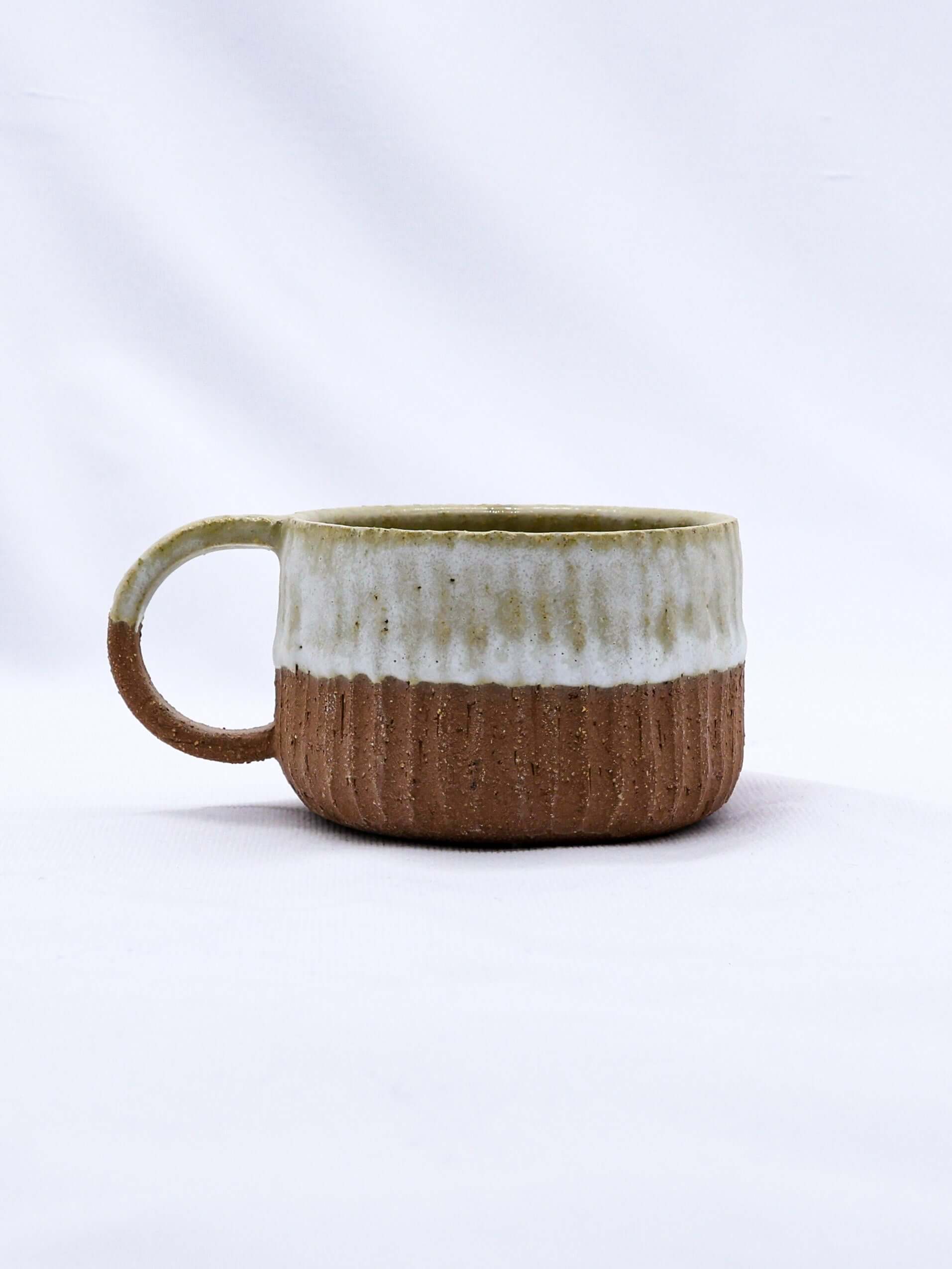 Bianca Arte Handmade Ceramic Terra Stoneware Mug showcasing eco-friendly craftsmanship in Brighton and Hove.