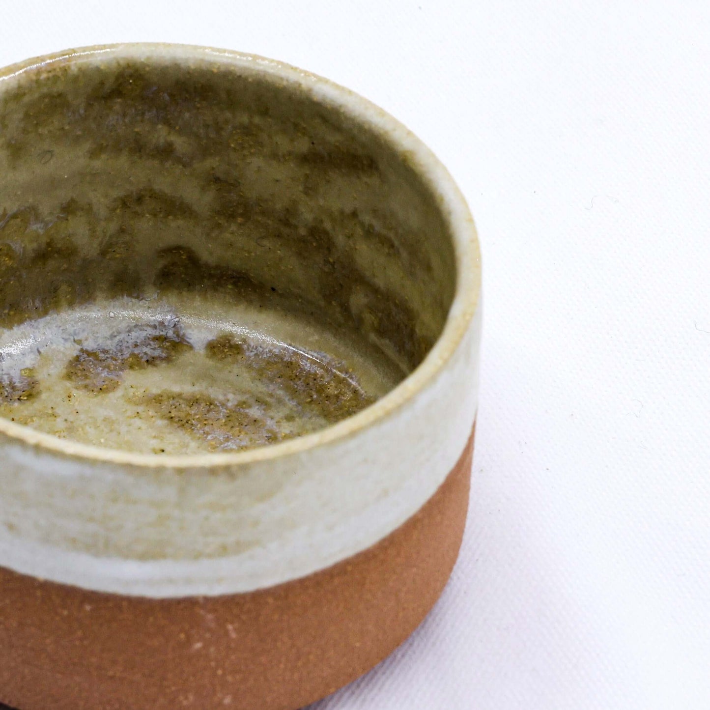 Bianca Grande Handmade Ceramic Terra Stoneware Mug showcasing its elegant interior design and eco-friendly craftsmanship.