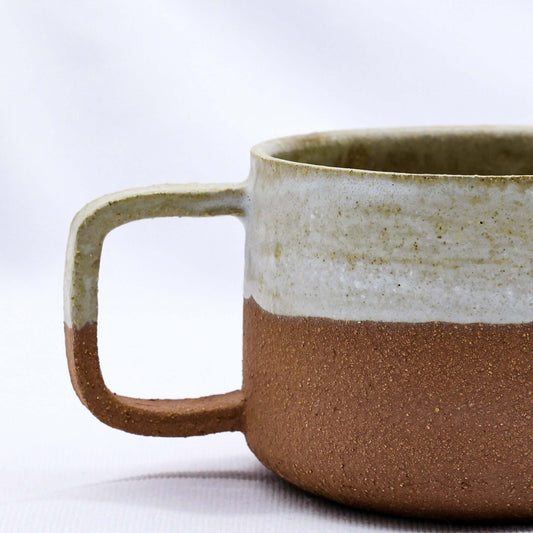 Bianca Grande Handmade Ceramic Terra Stoneware Mug showcasing rustic elegance and eco-friendly design in Brighton and Hove.