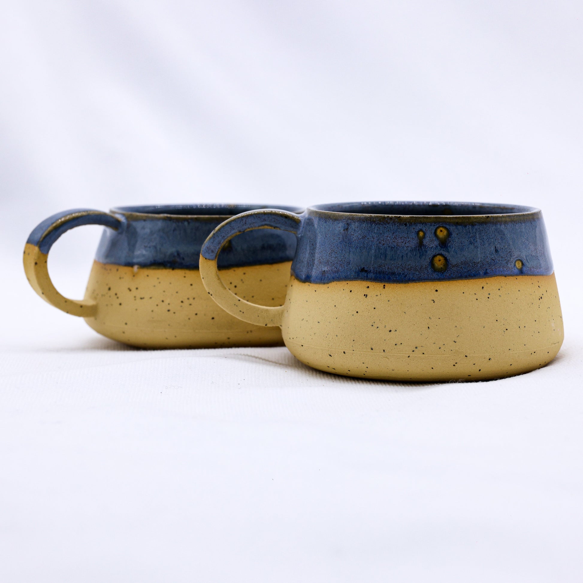 Bluvio Belluma Handmade Stoneware Ceramic Mug in blue and yellow, eco friendly online shop, Brighton and Hove, UK.