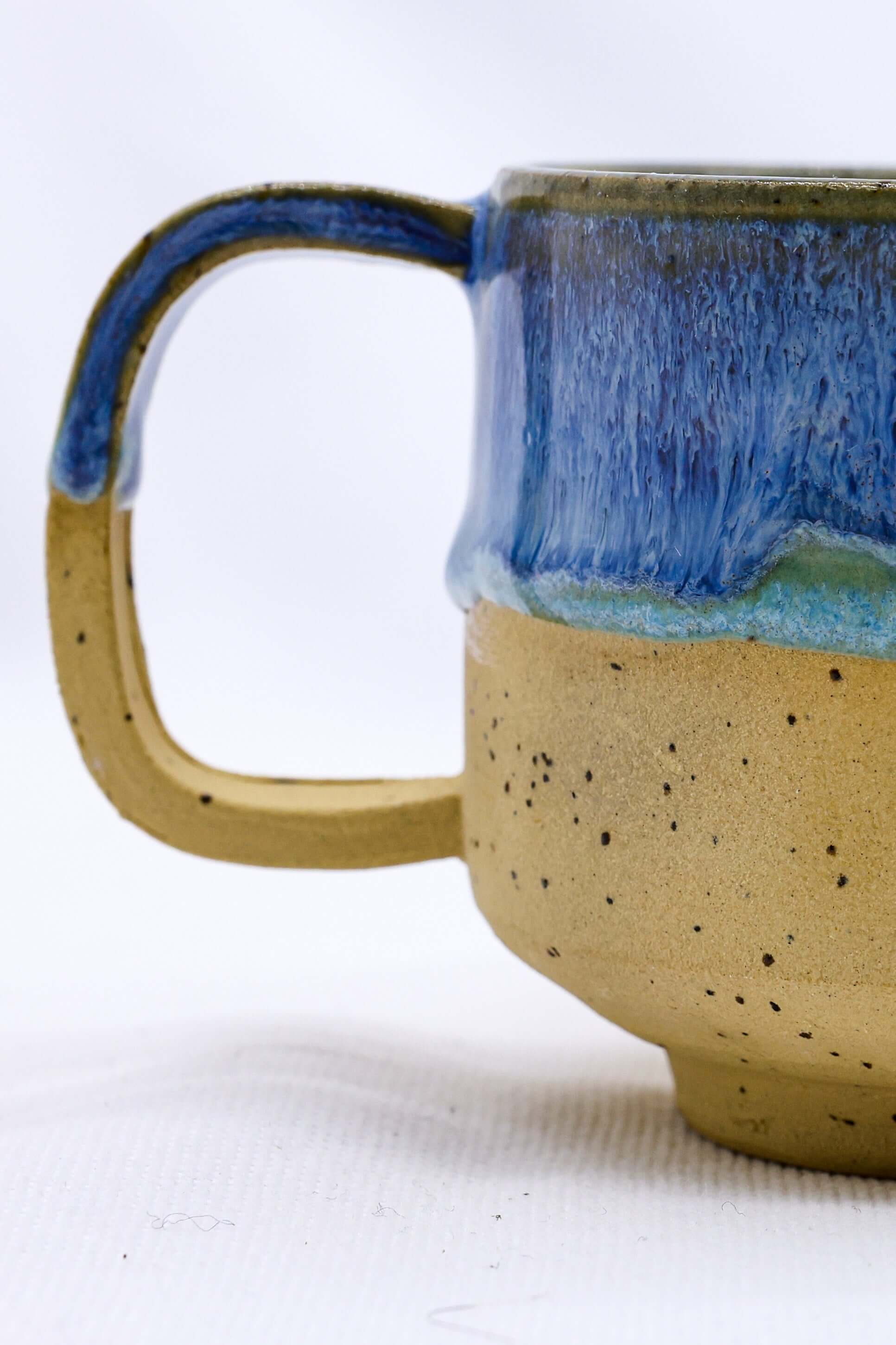 Bluvio Sienna Handmade Ceramic Mug side view showcasing elegant design, available in Eco Friendly Online Shop, UK, Brighton and Hove.