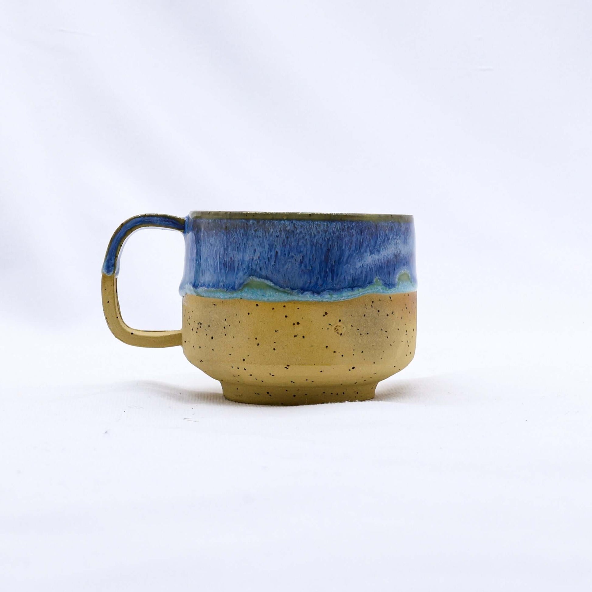 Bluvio Sienna Handmade Ceramic Mug showcasing elegant design, eco-friendly craftsmanship from Brighton and Hove, perfect for daily use.