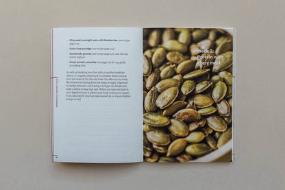 Open book showing a page with text and an image of roasted pumpkin seeds.