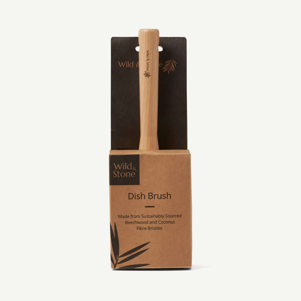 Dish brush with packaging on a white background