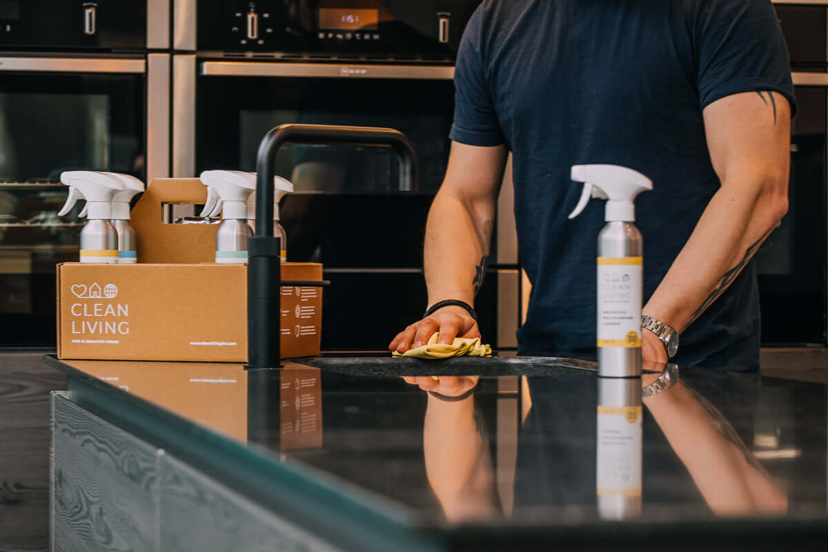 Eco Friendly, Probiotic, Complete Cleaning Kit being used for efficient cleaning in a modern kitchen.