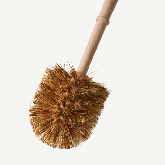 Bamboo scrubber with natural bristles on a light background