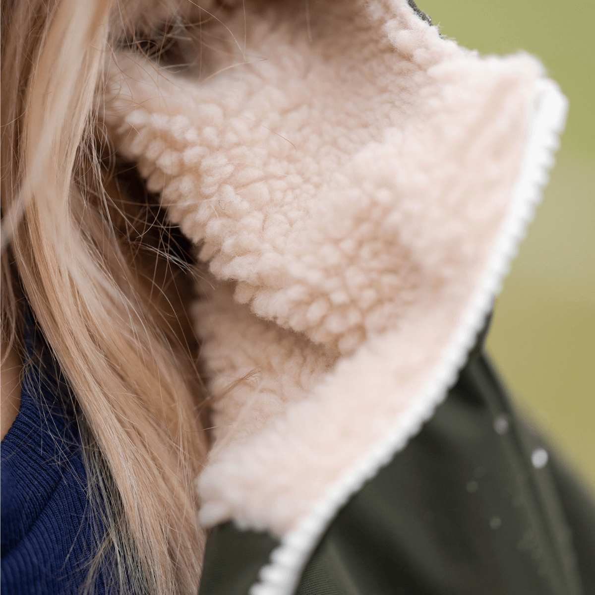 Detail of fleece lining in the Raincoat & Changing Robe in One - The Classic Cobe Olive Green.