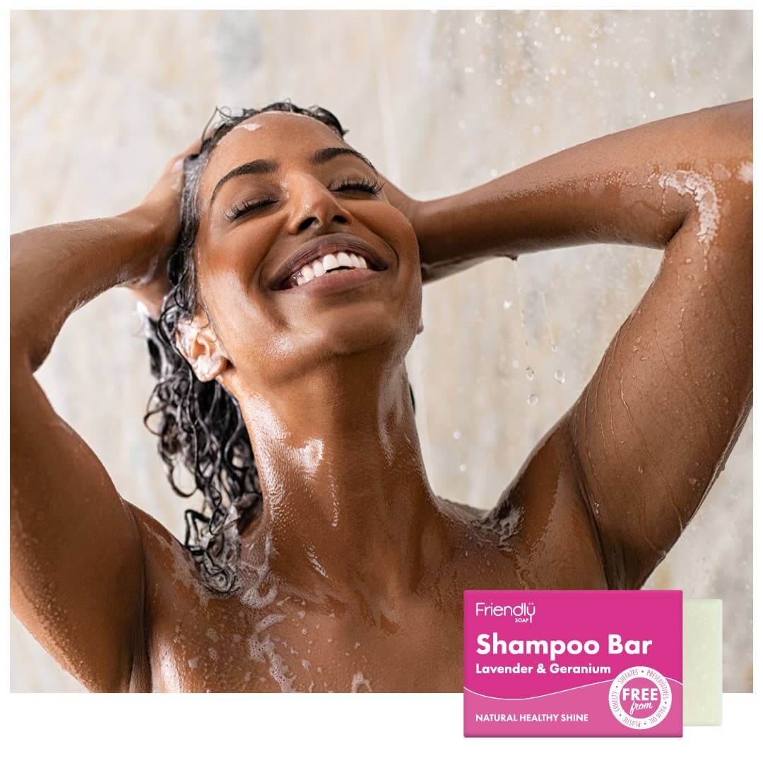 Bundle Refresh & Restore Shampoo Bar for healthy shine, featuring Lavender & Geranium in a woman enjoying her shower.