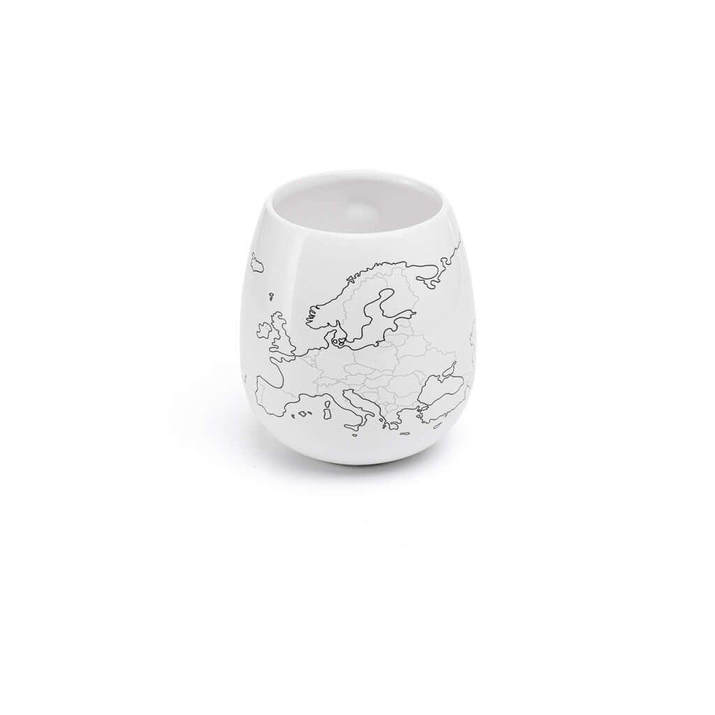 White ceramic cup with a black line drawing of Europe on a white background
