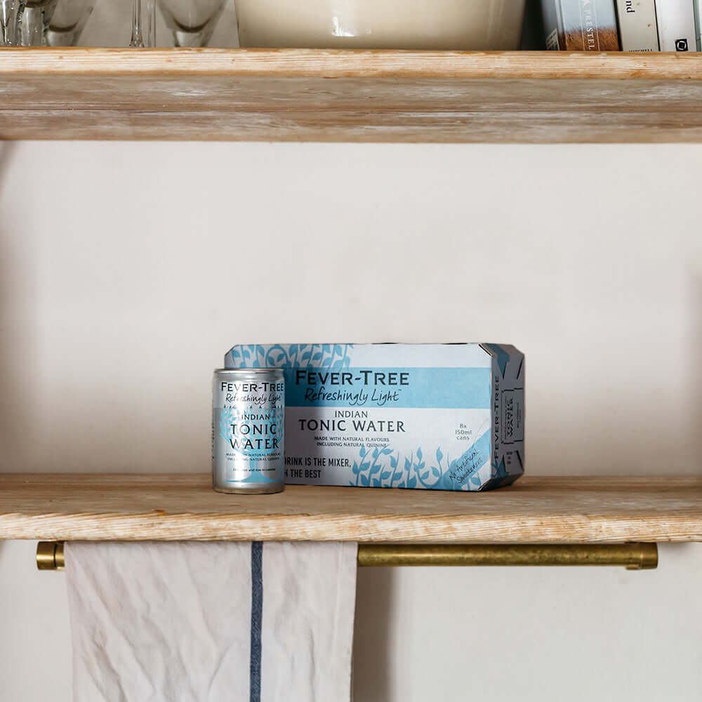 Pentire Starter Bundle featuring Fever-Tree Light Tonic Water on a wooden shelf for refreshing aperitifs.