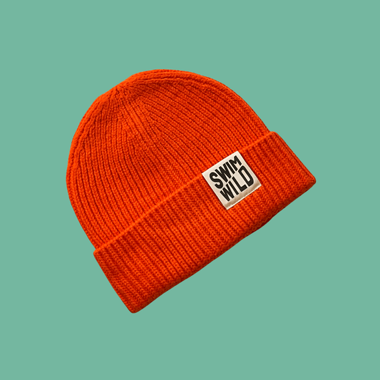 Fisherman’s knit hat in orange from Eco-Friendly-Online-Shop, offering warm, sustainable headwear for everyday wear.