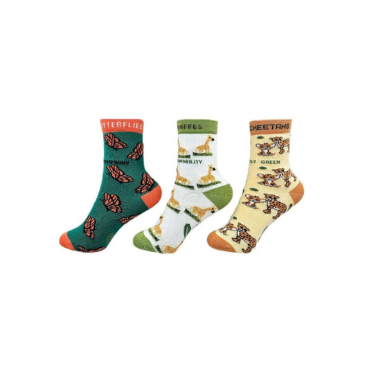 Three pairs of socks with different patterns on a white background