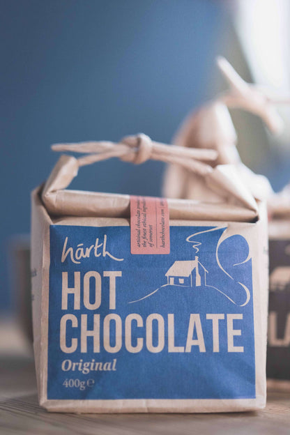 Box of Harth Hot Chocolate with a blue label on a blurred background
