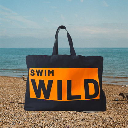 Jumbo Swim Wild Bag in navy and neon orange from Eco-Friendly-Online-Shop, offering a spacious, water-resistant design for sustainable open-water adventures.