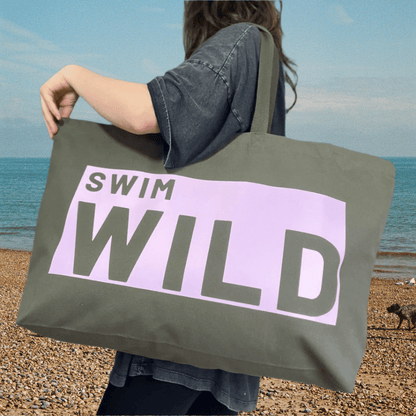 Jumbo Swim Wild Bag in olive and pink from Eco-Friendly-Online-Shop, offering a spacious, water-resistant design for sustainable open-water adventures.