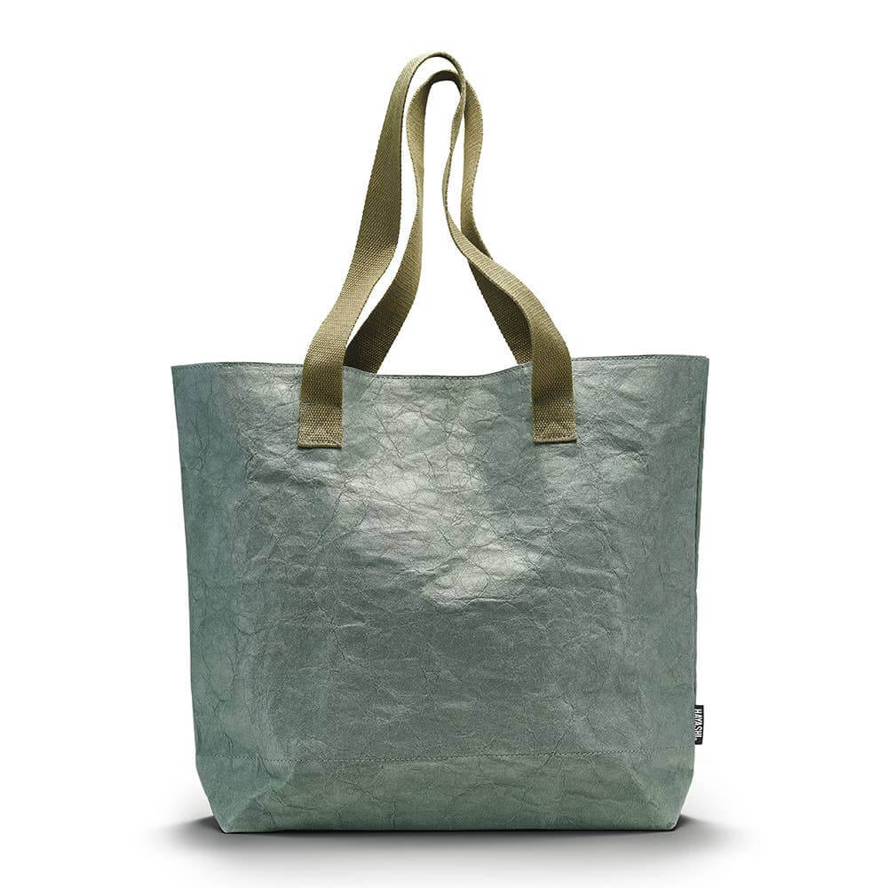 Green tote bag with green handles on a white background