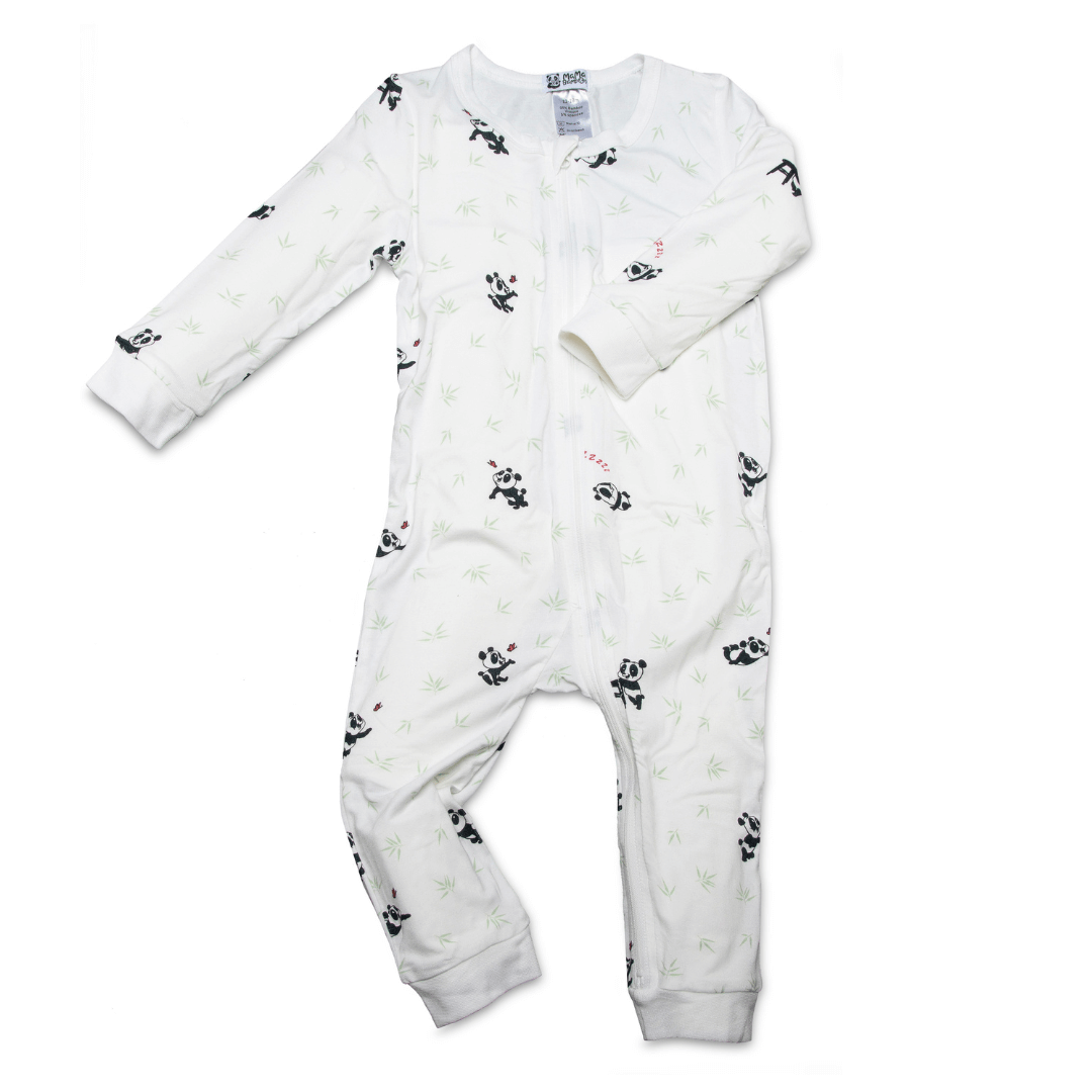 White baby onesie with black patterns on a white background